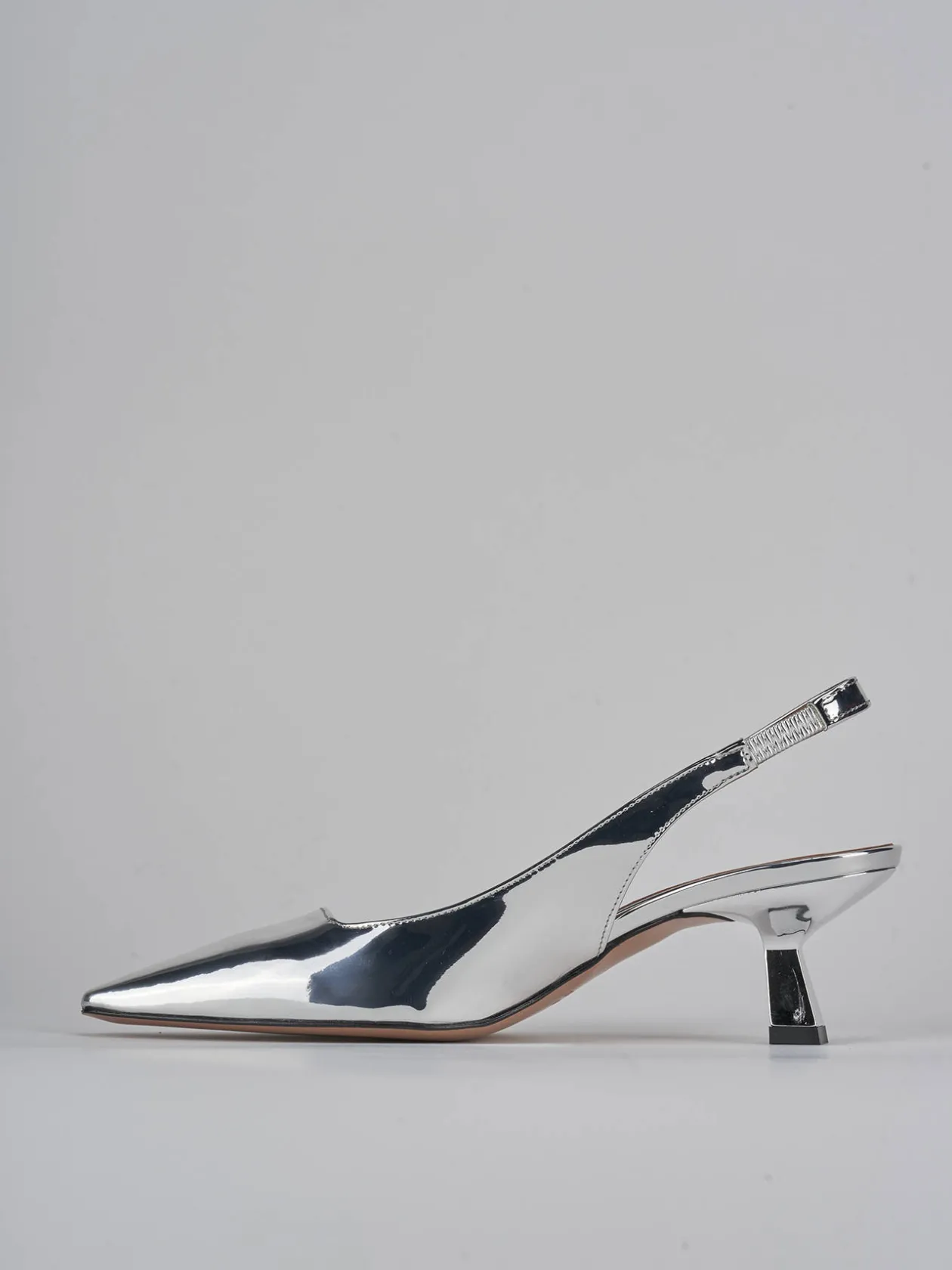 Décolleté e slingback tacco 6cm pelle argento
