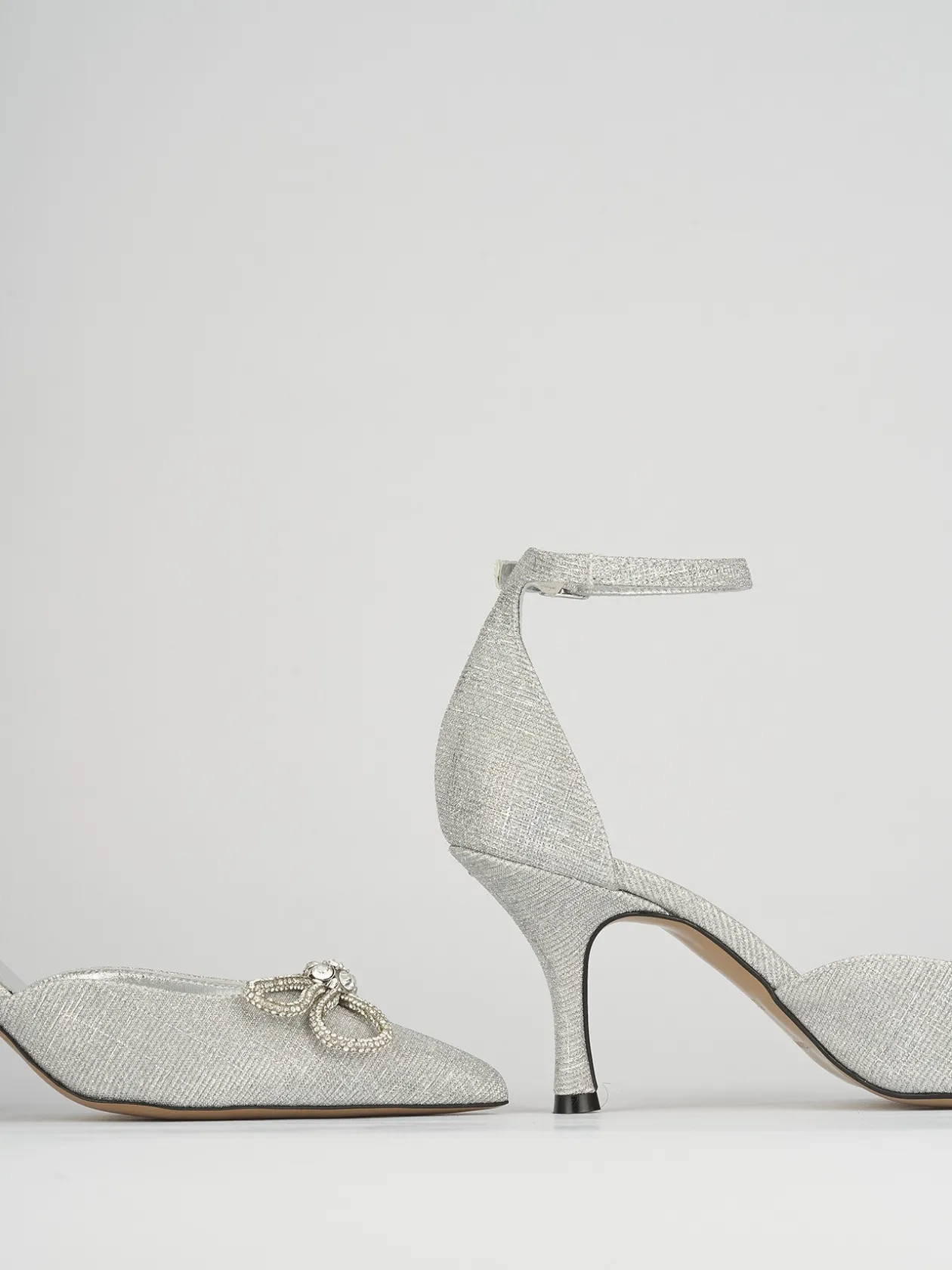 Décolleté e slingback tacco 7cm glitter argento