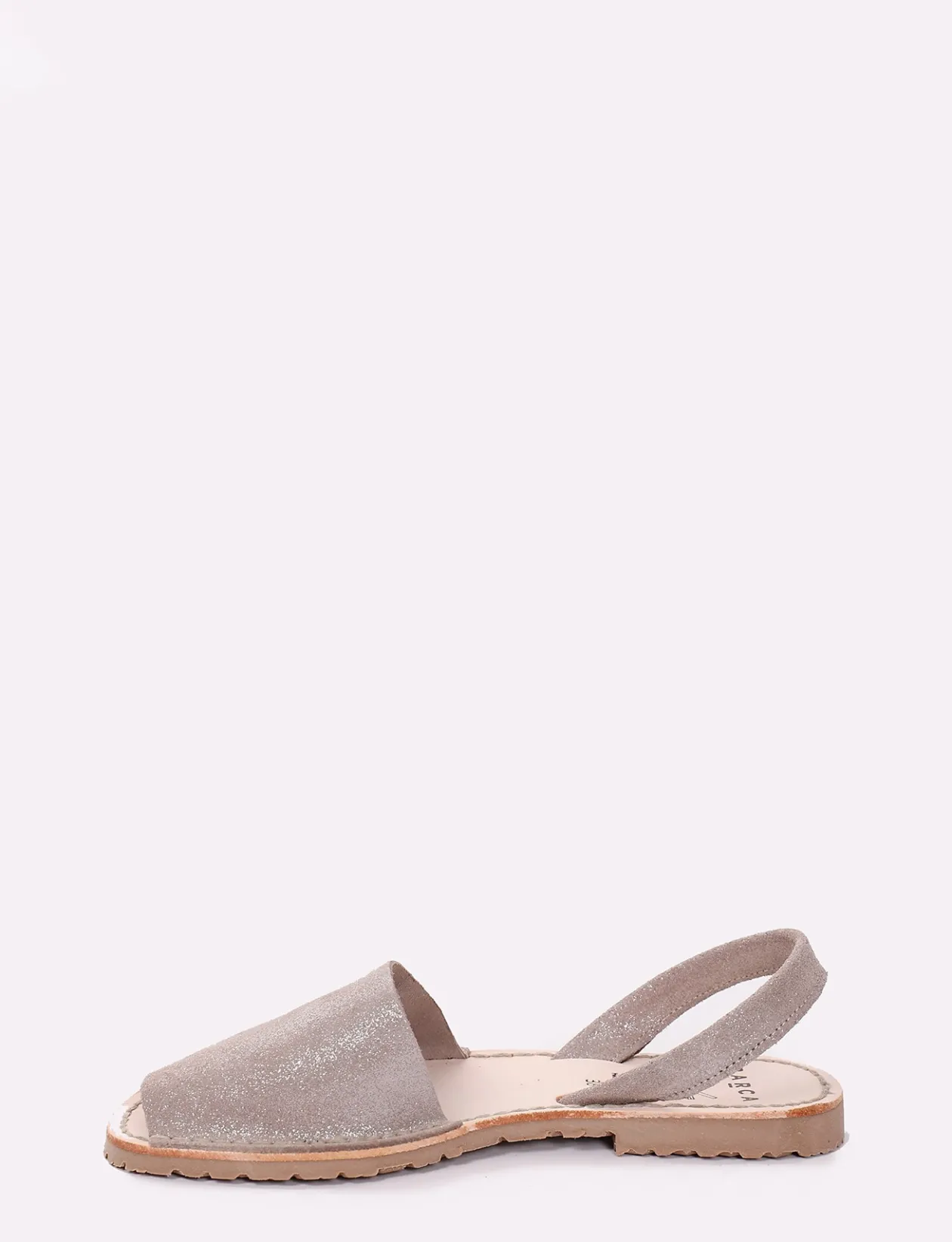 Minorchina fondo gomma e soletto interno in vera pelle. Tomaia in morbida pelle glitterata argento