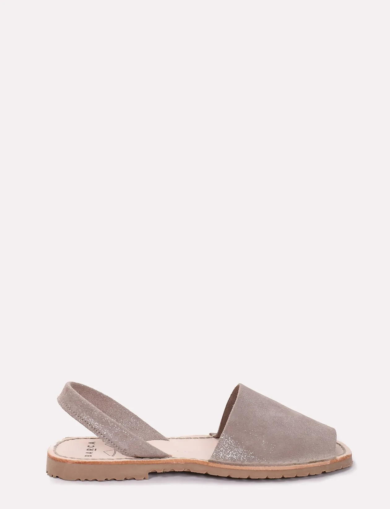 Minorchina fondo gomma e soletto interno in vera pelle. Tomaia in morbida pelle glitterata argento